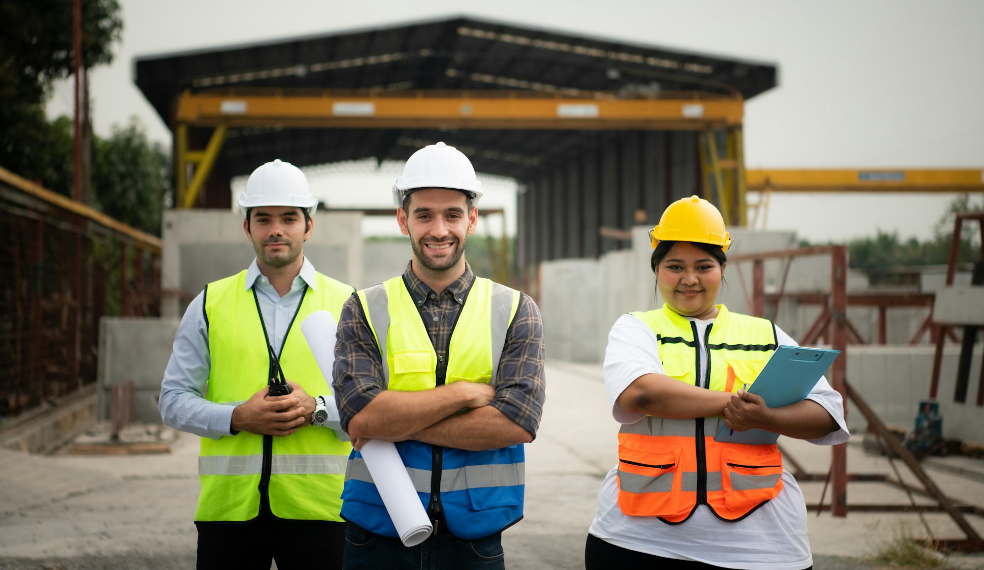 Architect portrait construction supervisor and construction engineer working on a construction